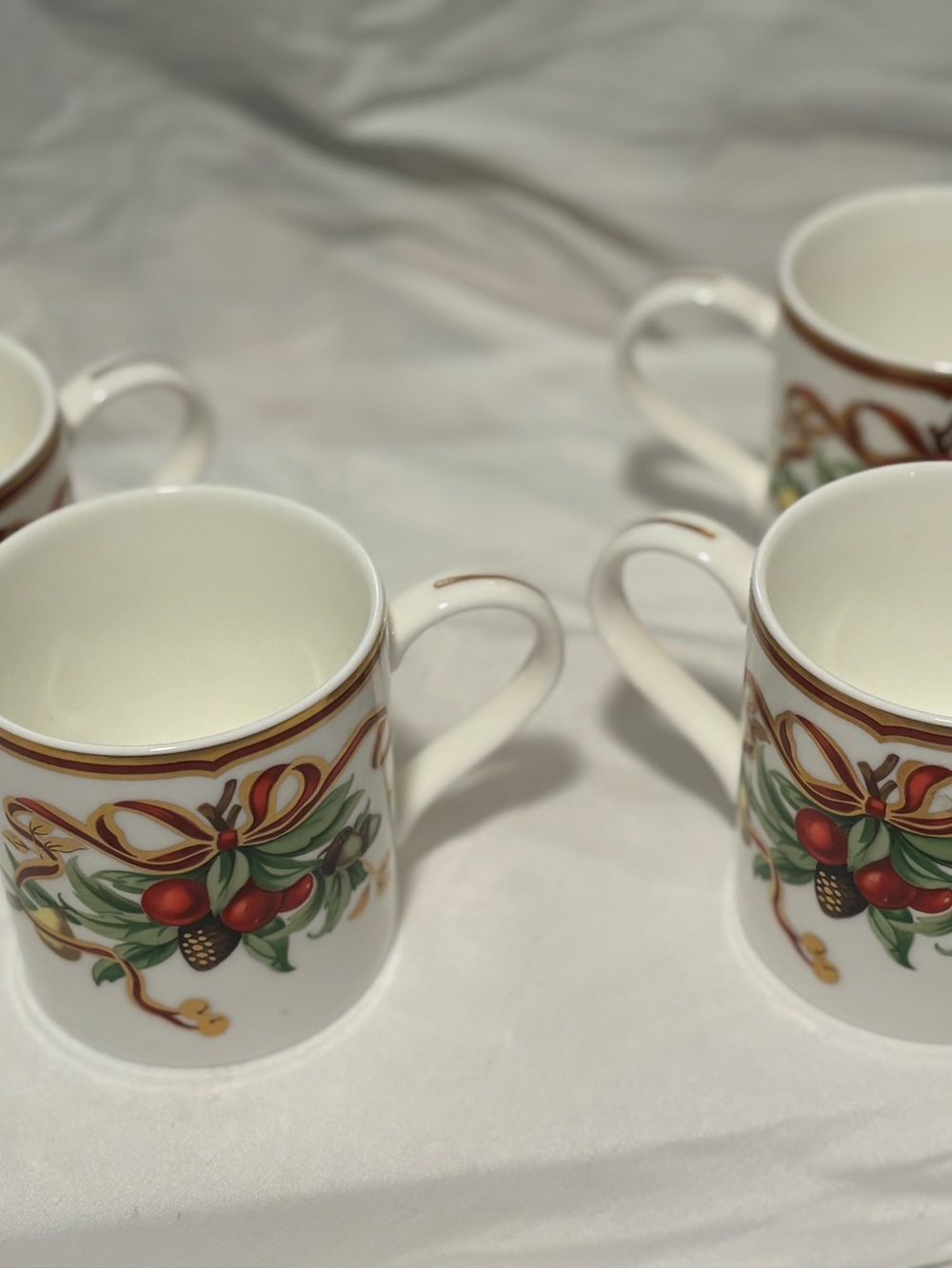 Tiffany & Co. White Ceramic Mugs with Red, Green and Gold Holiday Motif